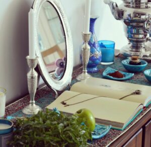 The mirror on the Haft-sin table during Nowruz